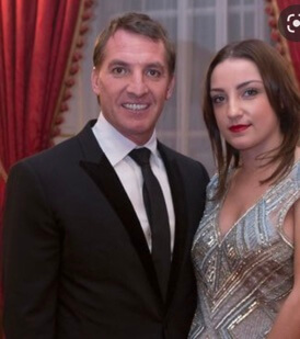 Susan Rodgers's ex-husband, Brendan Rodgers, and a daughter, Mischa Rodgers. 